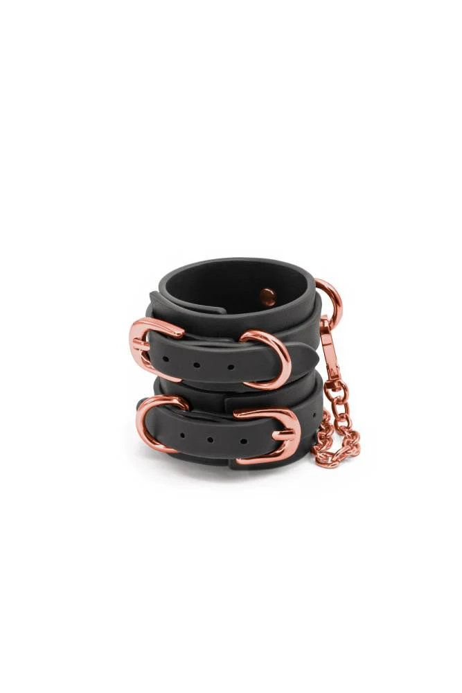 NS Novelties - Bondage Couture - Wrist Cuffs - Black/Rose Gold